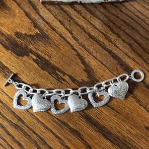 Silver-tone costume jewelry bracelet with hearts